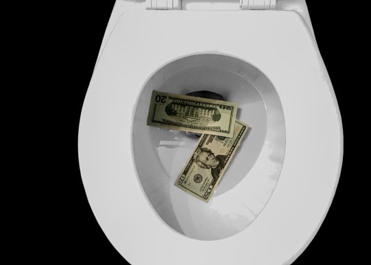 Bills in toilet bowls to show money being flushed