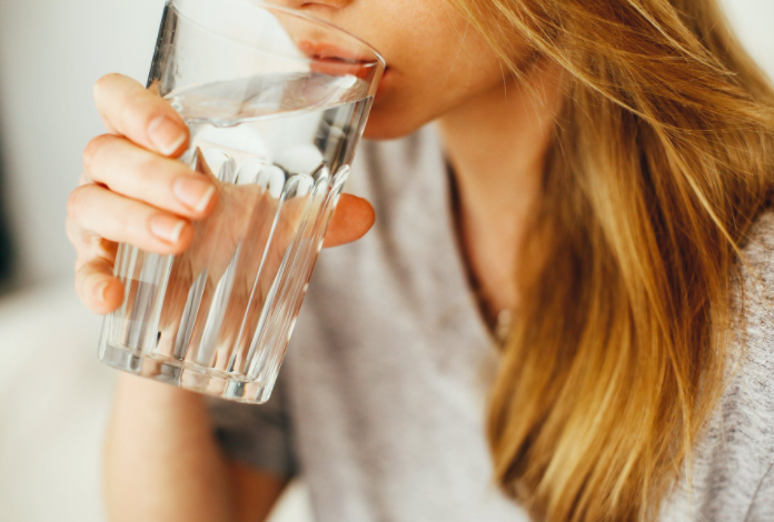 a woman drinking water