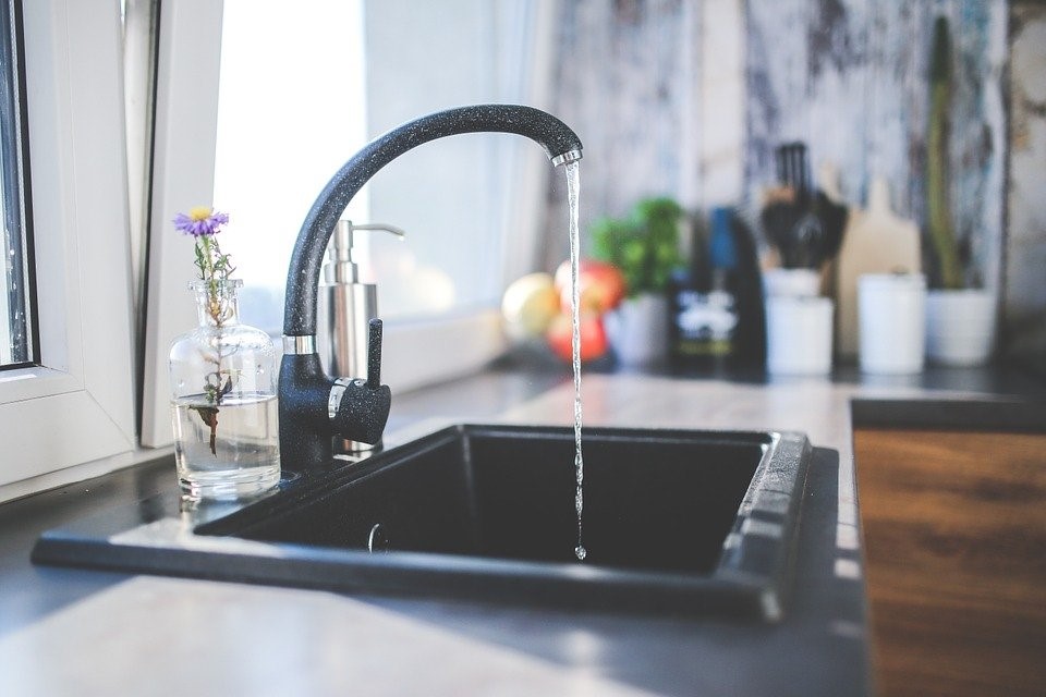 A running faucet with water