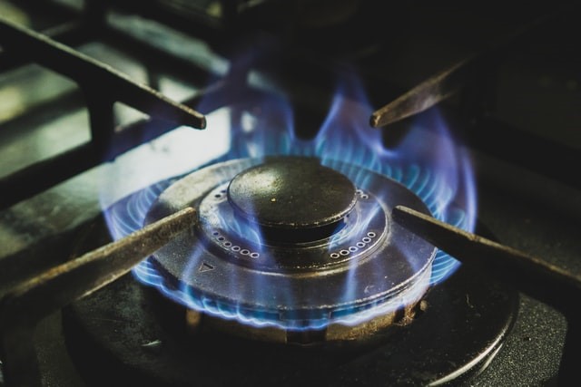 A lit gas stove 