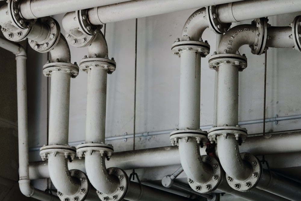 Metal pipes of a plumbing system